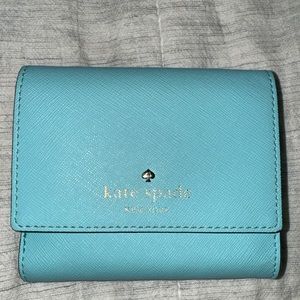 Kate Spade Tiffany blue wallet in absolute pristine condition.